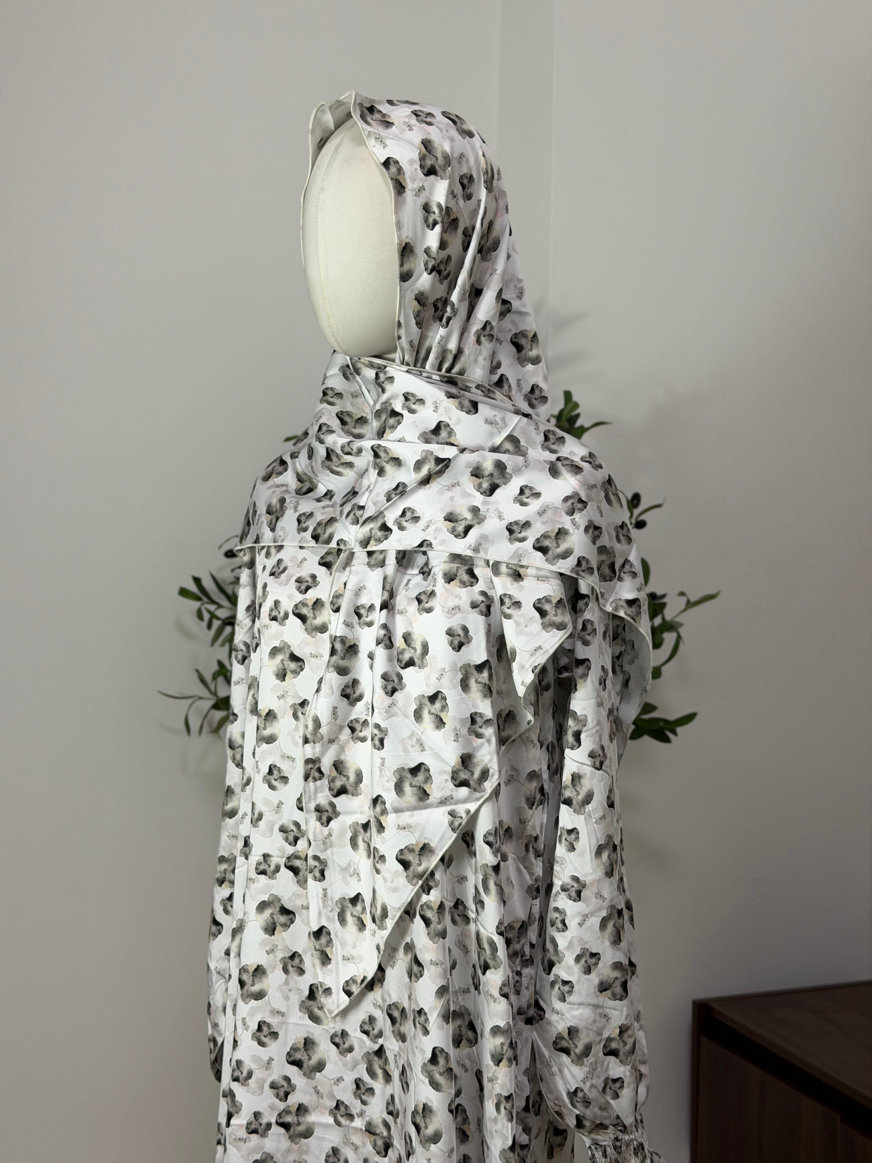 Kleid mit floralem Muster in grau